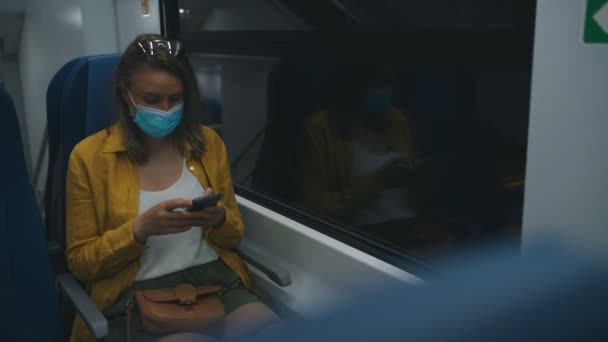 Woman Medical Mask Travels Train — Stock video