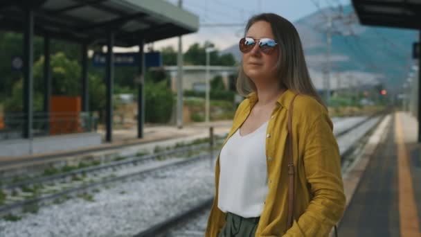 Woman Sunglasses Waiting Her Train — Wideo stockowe