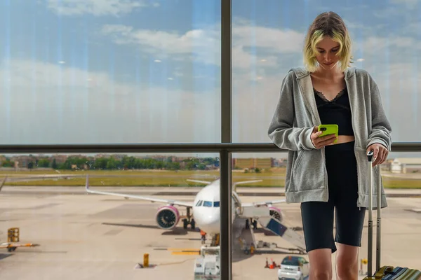 Teenage Girl Waiting Her Flight Airport — стоковое фото