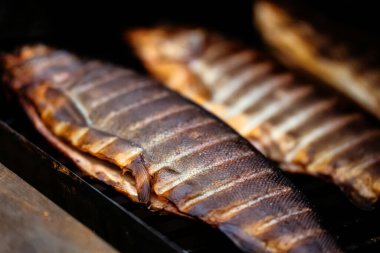 Rainbow trout smoked on grill bbq.