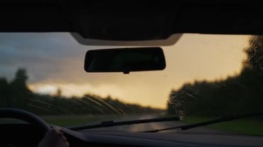 Driving car in bad weather conditions. Heavy rain.