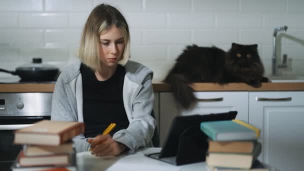 Teenage Girl Doing Her Schoolwork Home — Stockvideo