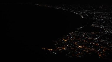 City at night from an airplane. Naples, italy.