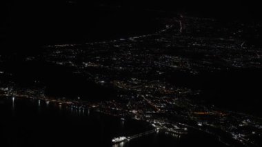 City at night from an airplane. Naples, italy.