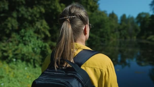 Woman Tourist Backpack Standing Lake — Stok Video