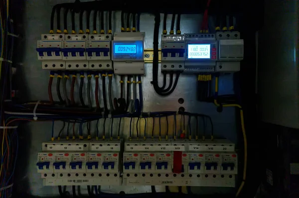 Close-up view of switches on fuse board.