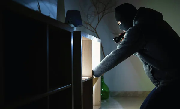 Masked Robber Flashlight Torch Checking Apartment — Stock Photo, Image