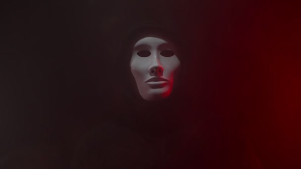 Mann Trägt Maske Mit Kapuzenpulli Auf Neon Hintergrund — Stockvideo