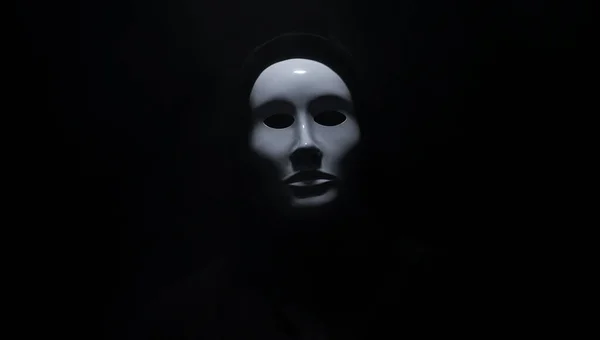 Mann Trägt Maske Mit Kapuzenpulli Auf Schwarzem Hintergrund — Stockfoto