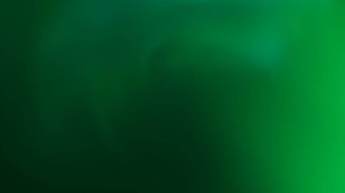 Yeşil ışık arka planda sızıntı yapıyor. 4K 'da gerçek atış..