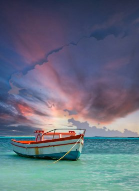 Fisherman's boat in a tranquil bay outside of Oranjestad Aruba.