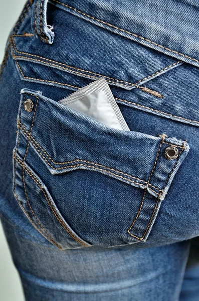 Condom in back pocket — Stock Photo, Image