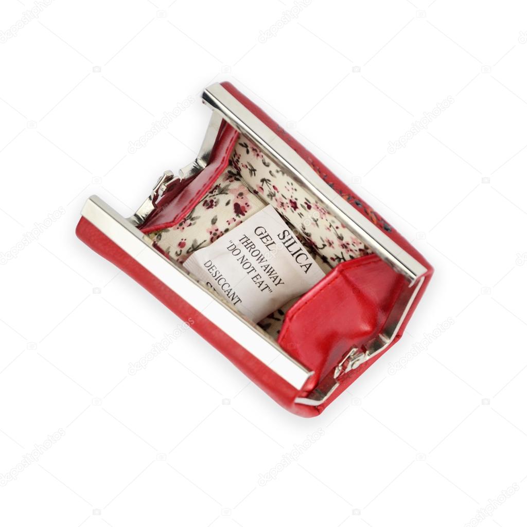 Red opened purse with silica gel