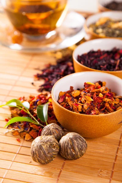 Various dry tea in small bowls — Stock Photo, Image