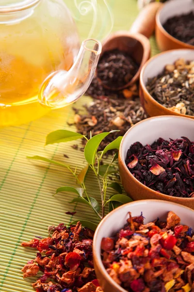 Various dry tea in small bowls — Stock Photo, Image