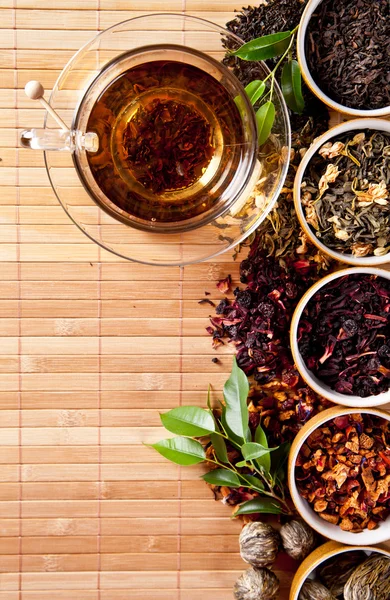 Various dry tea in small bowls — Stock Photo, Image