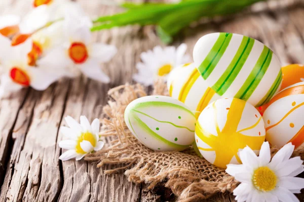 Easter colored eggs on wood — Stock Photo, Image