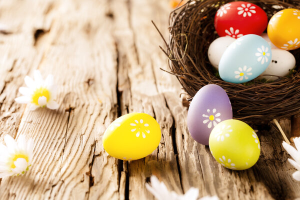 Easter eggs on wooden surface
