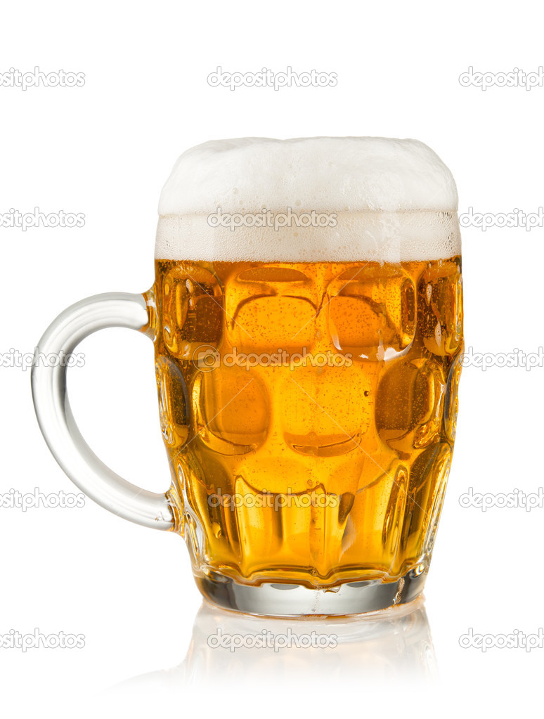 Half litre glass of beer on white background