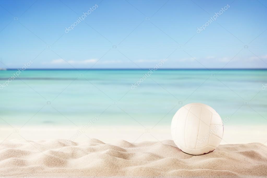 Beach volleyball ball on sandy beach
