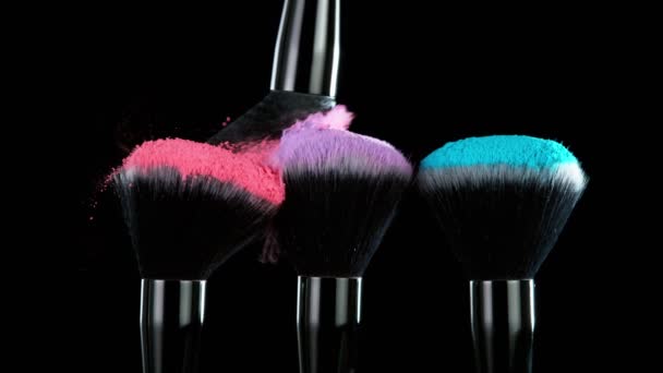 Super Slow Motion Makeup Brushes Flying Colored Powder Filmed High — Stock Video