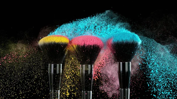 Soft Cosmetics Brush Releasing Cloud Colored Face Powder Black Background — Stock Photo, Image