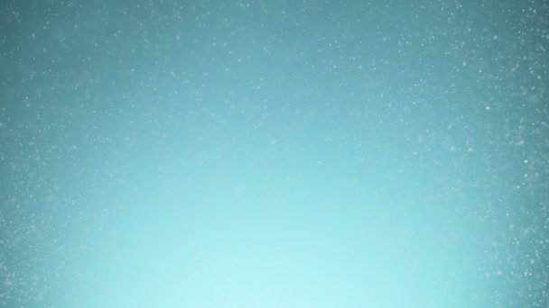 Super Langzame Beweging Van Kunstmatige Sneeuw Vallen Blauwe Achtergrond Gefilmd — Stockvideo