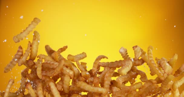 Super Slow Motion Flying French Fries Golden Background Filmed High — Stock Video