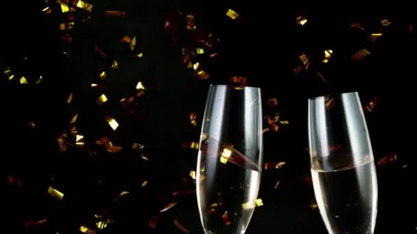 Super Slow Motion Having Toast Two Champagne Glasses Glittering Confetti — Stock Video