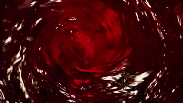Super Slow Motion Pouring Red Wine Whirl Shape Filmed High — Stock Video