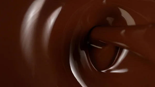 Closeup Pouring Dark Melted Chocolate Top View — Stock Photo, Image