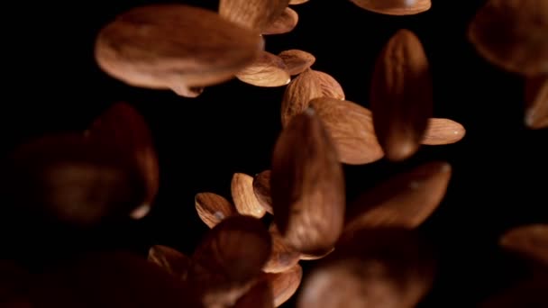 Super Slow Motion Falling Almonds Pieces Wide Super Macro Shot — Stock Video