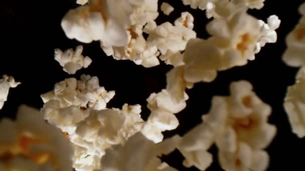 Super Slow Motion Falling Popcorn Wide Macro Shot Isolated Black — Stock Video