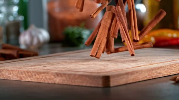 Super Slow Motion Falling Cinnamon Spice Wooden Board Filmed High — 图库视频影像