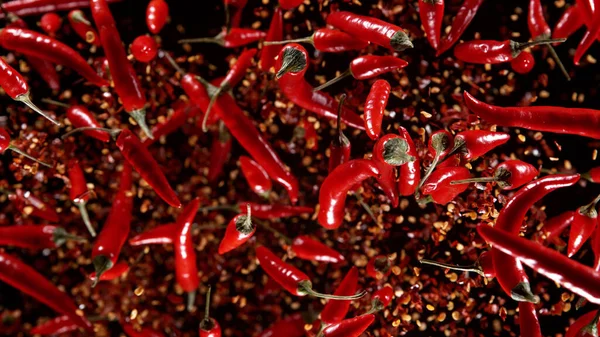 Movimento Congelamento Peperoncini Volanti Sfondo Nero Concetto Cibo Volante — Foto Stock