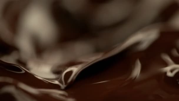 Movimento Super Lento Chocolate Quente Escuro Espirrando Close Filmado Câmera — Vídeo de Stock