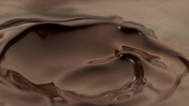 Super Slow Motion Flowing Dark Hot Chocolate Splashes Filmed High — Stock Video