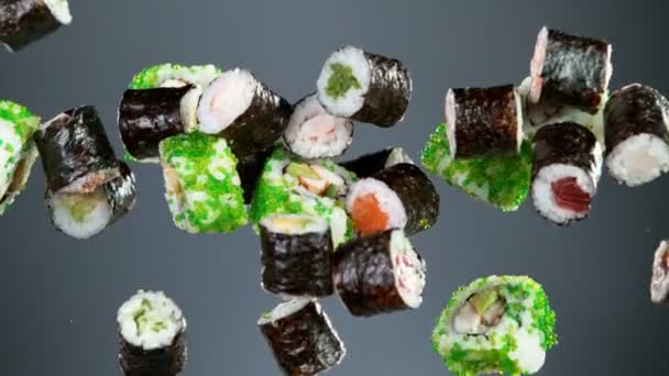 Super Slow Motion Flying Sushi Pieces Black Background Speed Ramp — Stock Video