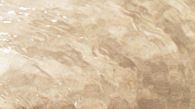 Su dalgalı kum dokusu. Soyut su yüzeyi, plaj konsepti.