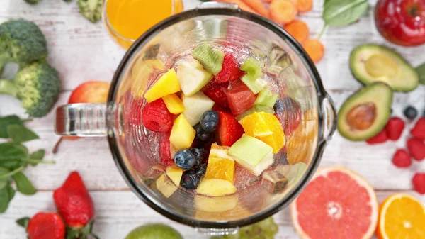 Mixing Pieces Fruits Blender Top View — Stock Photo, Image