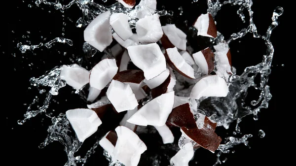 Freeze Motion Coconuts Water Splash Isolated Black Background — Stock Photo, Image