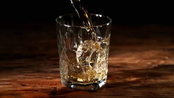 Super Slow Motion Pouring Whiskey Glass Placed Old Wooden Table — Stock video