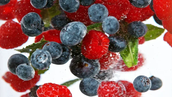 Close Various Kind Berries Water Isolated White Background — Stock fotografie