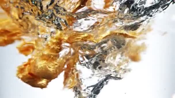 Super Slow Motion Rotating Golden Paint Water Filmed High Speed — Vídeos de Stock