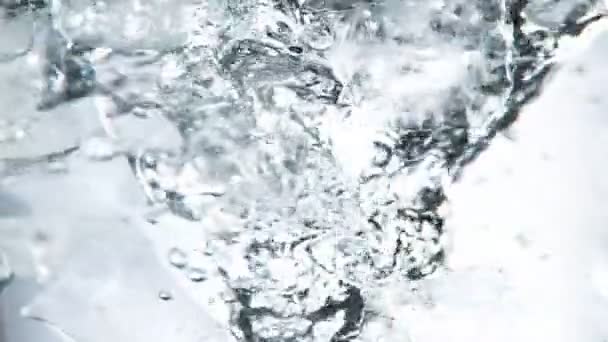 Super Slow Motion Rotating Ice Cubes Water Filmed High Speed — Video