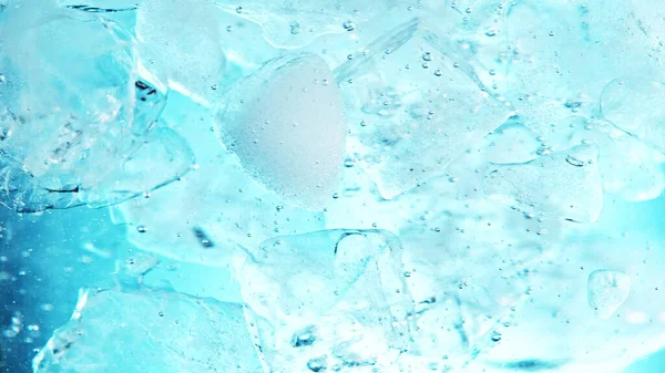 Close Ice Cubes Underwater Blue Background Freeze Motion Flowing Ice — 스톡 사진