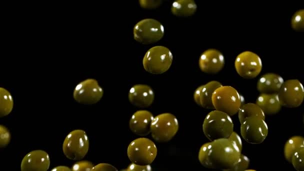 Super Slow Motion Flying Green Olives Black Background Filmed High — Video Stock