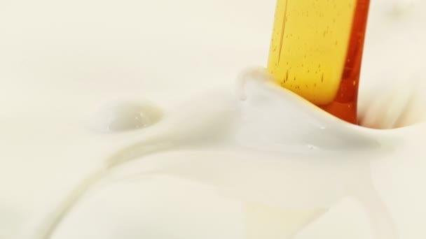 Super Slow Motion Mixing Cream Oil Detail Filmed High Speed — Stock Video