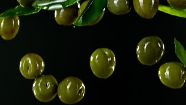 Super Slow Motion Falling Green Olives Oil Filmed High Speed — Video Stock