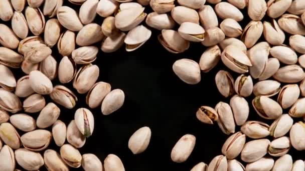 Super Slow Motion Blowing Pistachio Black Background Filmed High Speed — Stock Video